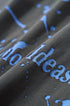 Fabric close-up black "NO More Ideas" long sleeve streetwear t-shirt