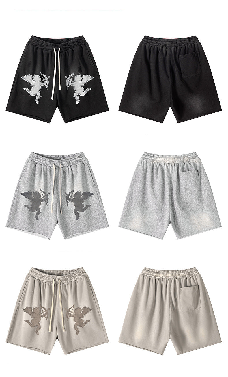 Product layout showing cupid graphic shorts in black, gray and beige colorways with front and back views