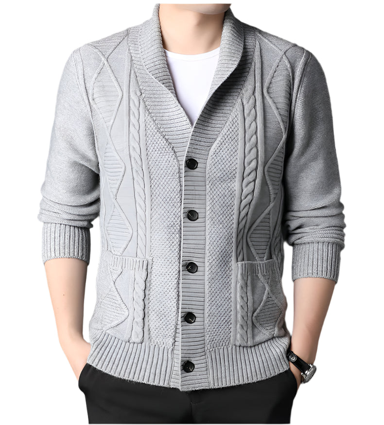 Light gray cable knit cardigan with shawl collar, black buttons, and textured diamond pattern, displayed on mannequin with white undershirt and black pants