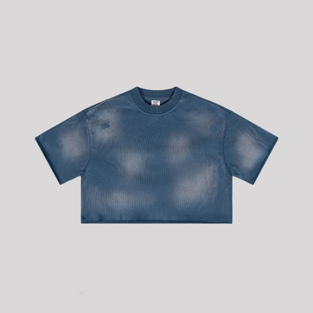 Navy blue cropped t-shirt with crew neck and subtle wash effect displayed flat against light gray background