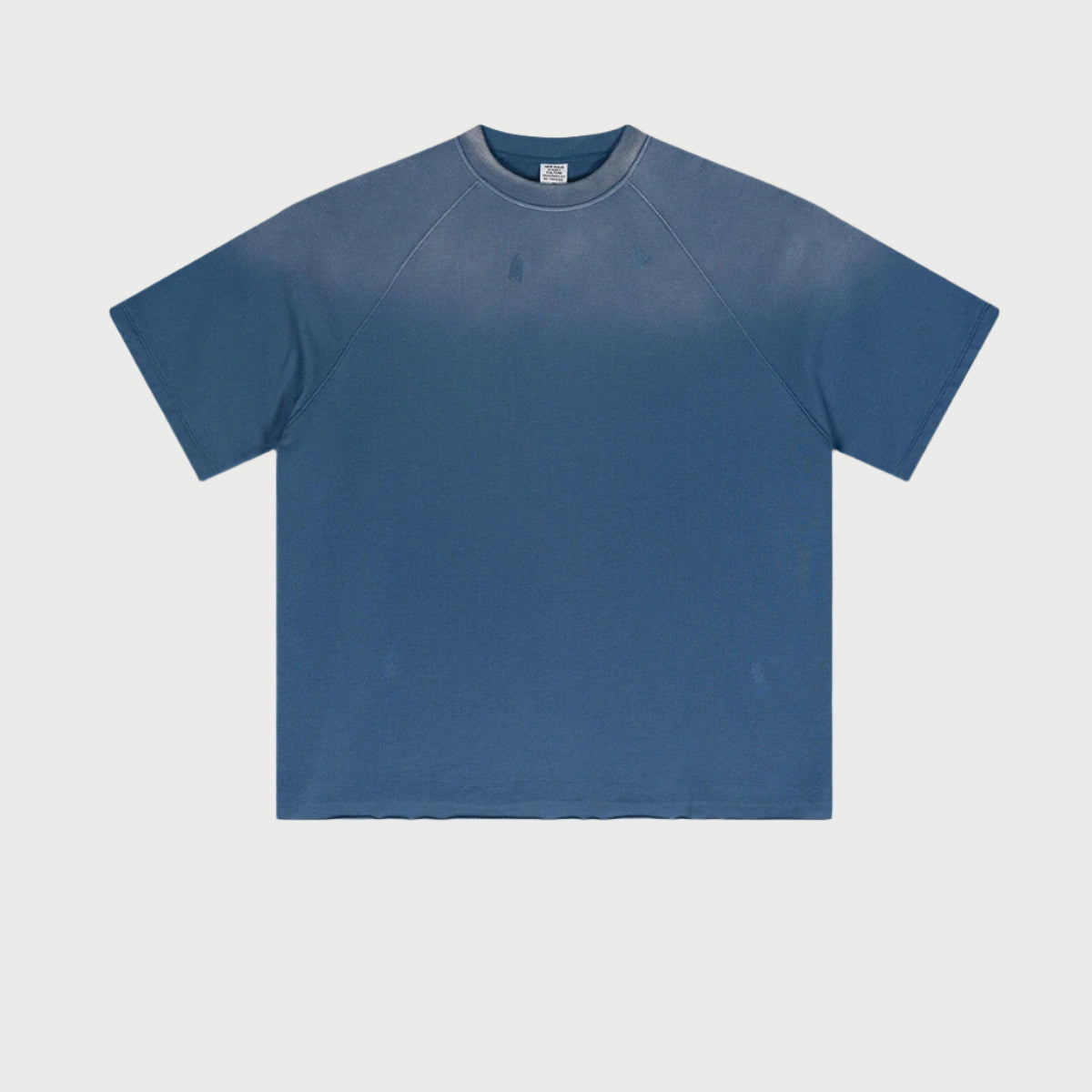 Navy blue oversized t-shirt with raglan sleeves displayed flat against light gray background.