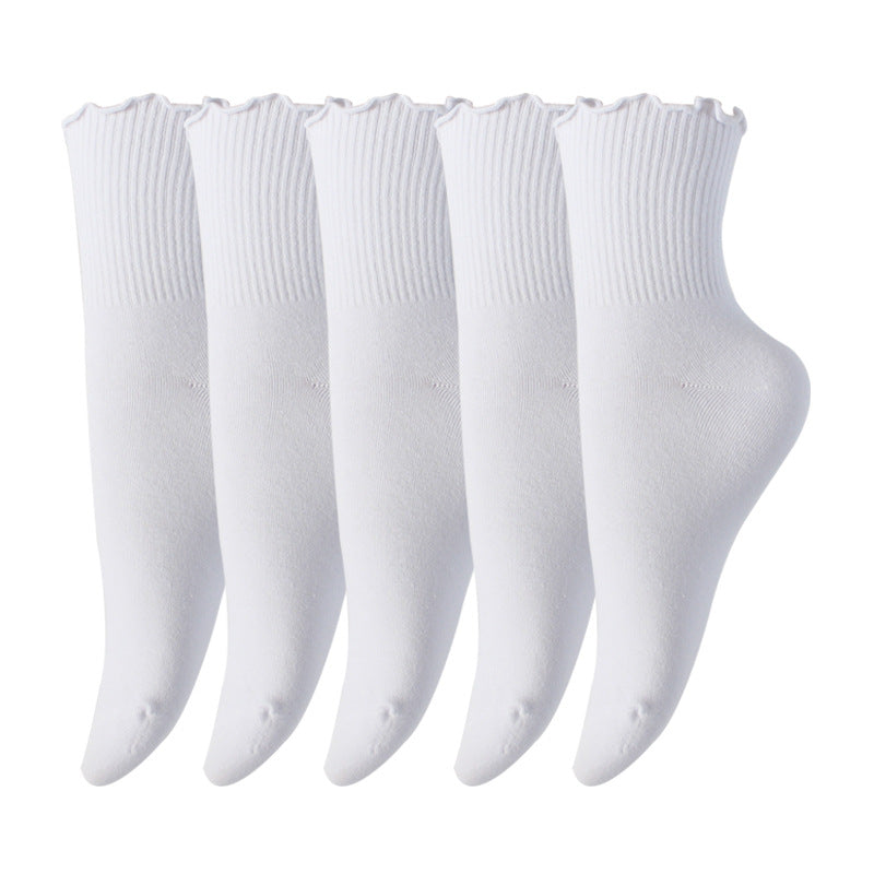 Five pairs of white ankle socks with ribbed cuffs and scalloped edges displayed side by side against white background