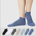 A model is wearing blue ankle socks against white background. Below shows color options including black, white, gray, beige, light blue and navy blue styles