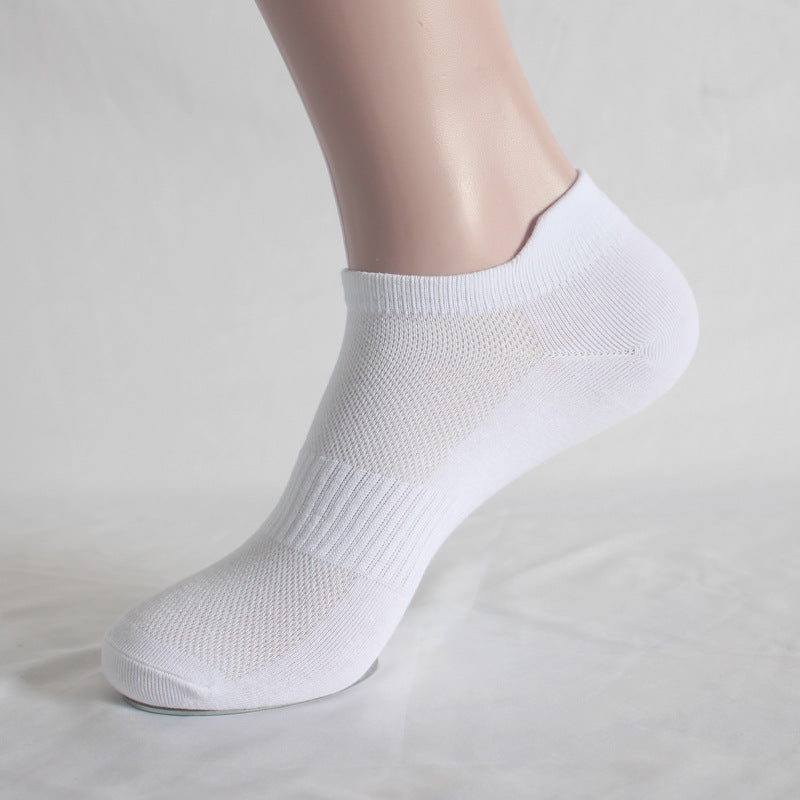 White athletic ankle sock on mannequin foot showing full profile view