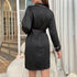 Back view of black satin robe showing contrast piping and belt tie detail, classic loungewear design