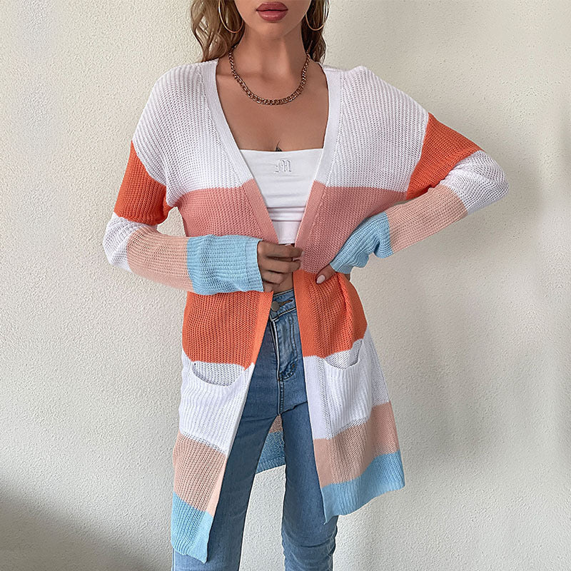 Long color-block cardigan, white crop top, gold chain necklace