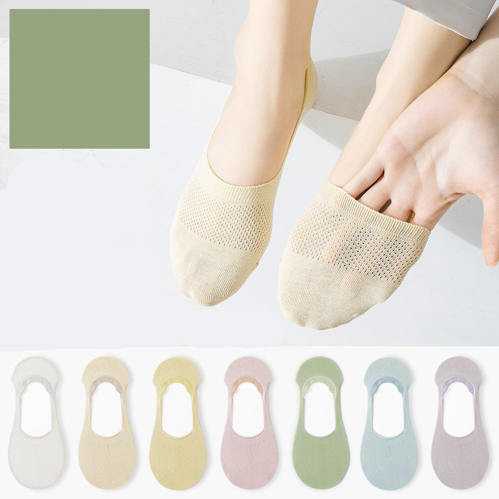 Pure cotton no-show socks in pastel colors displayed on feet and as a collection, featuring mesh knit design and silicone grips
