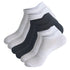 Collection of ankle socks in white and black, featuring mesh ventilation and ribbed arch support