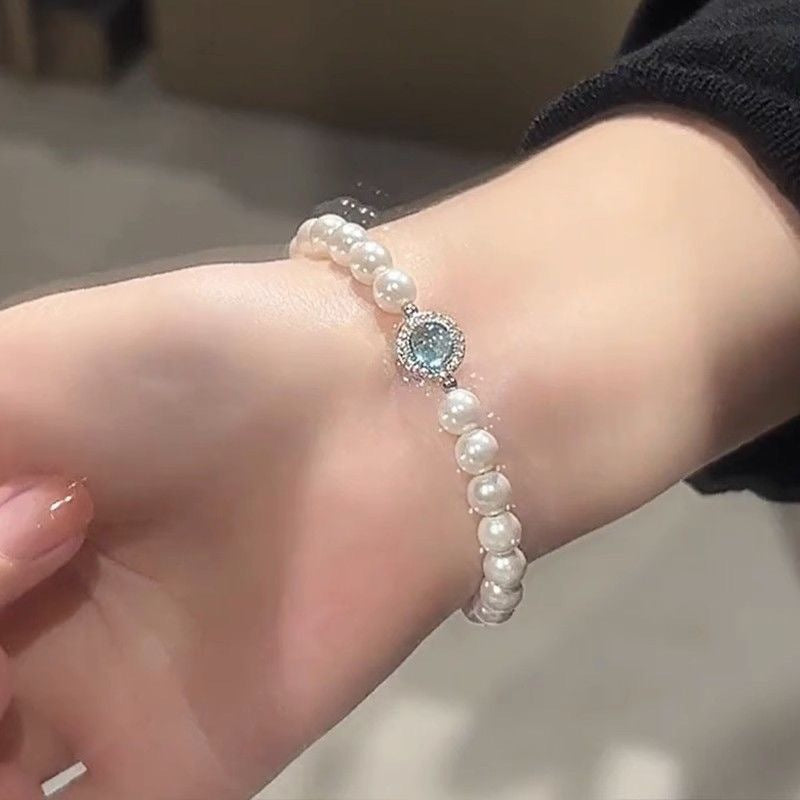 Pulsera de lágrima de cristal azul y perla