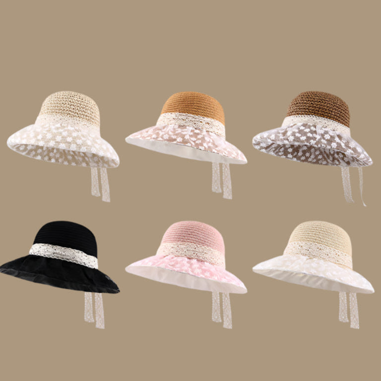 A collection of six woven sun hats in beige, brown, pink, black, and vanilla each featuring a lace-trimmed brim and tied ribbons, displayed against a neutral background.