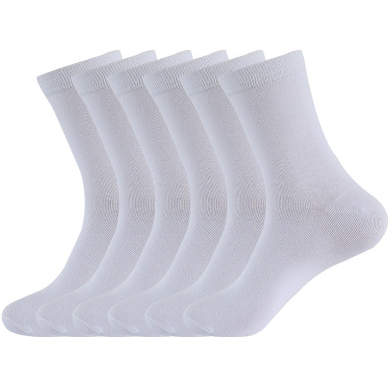 Six white cotton crew socks displayed together, showcasing plain, versatile everyday sock design