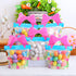 Transparent gift bags filled with colorful speckled eggs, featuring pink bow handles, set against a festive Easter backdrop.