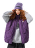 Model wearing purple down vest, gray sweatshirt and lavender knit beanie, touching hat, vest unzipped showing California text, curly hair