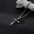 Silver rose cross pendant necklace with detailed flower accent on box chain displayed against black slate with white column