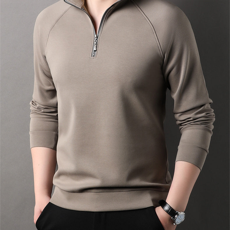 Close-up of taupe quarter-zip pullover sweater showing collar detail and silver zipper pull against neutral background