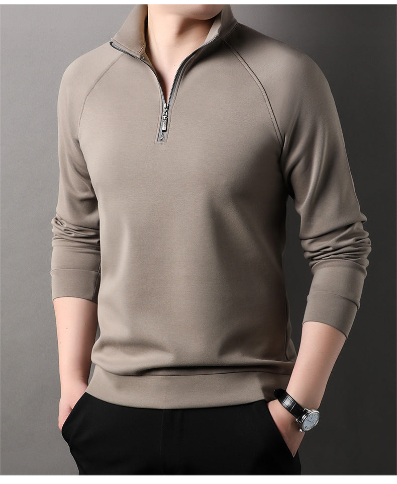 Close-up of taupe quarter-zip pullover sweater showing collar detail and silver zipper pull against neutral background