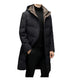 A side view of a man wearing a black puffer coat with a hood, showcasing the sleek quilted design and structured fit
