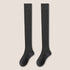 Pair of dark gray knee-high socks with full-leg coverage displayed against neutral background