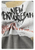 Close-up of "New Adventures Ahead" graphic print showing distressed vintage-style printing technique