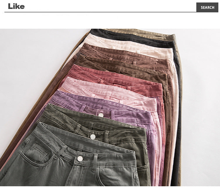 Close-up of khaki wide-leg jeans zipper detail, highlighting quality metal hardware