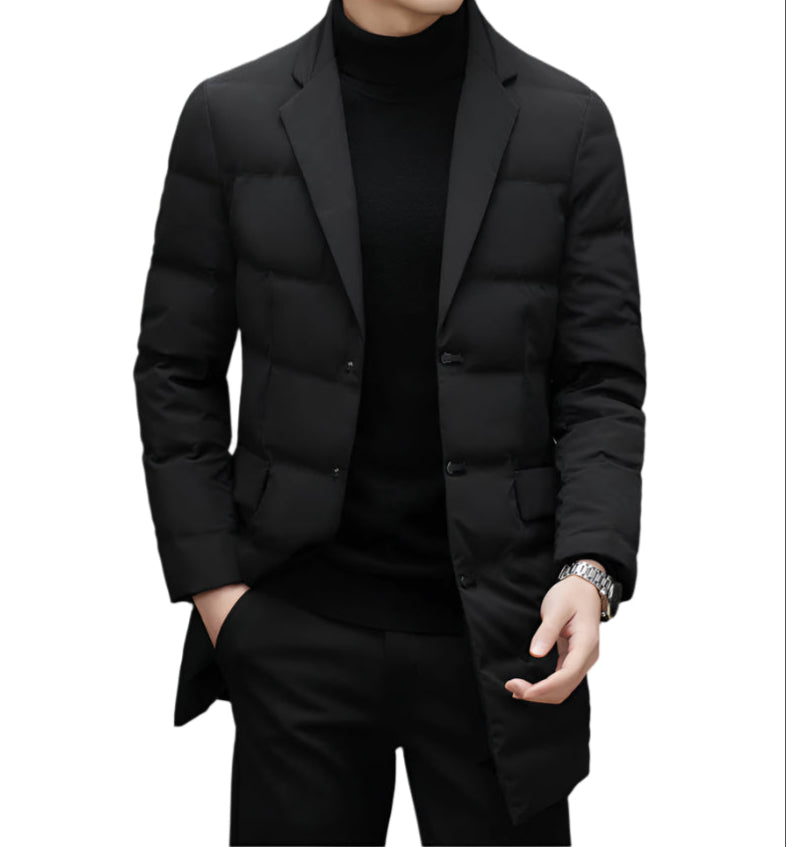 Black quilted down blazer coat with notched lapels worn with turtleneck and silver watch