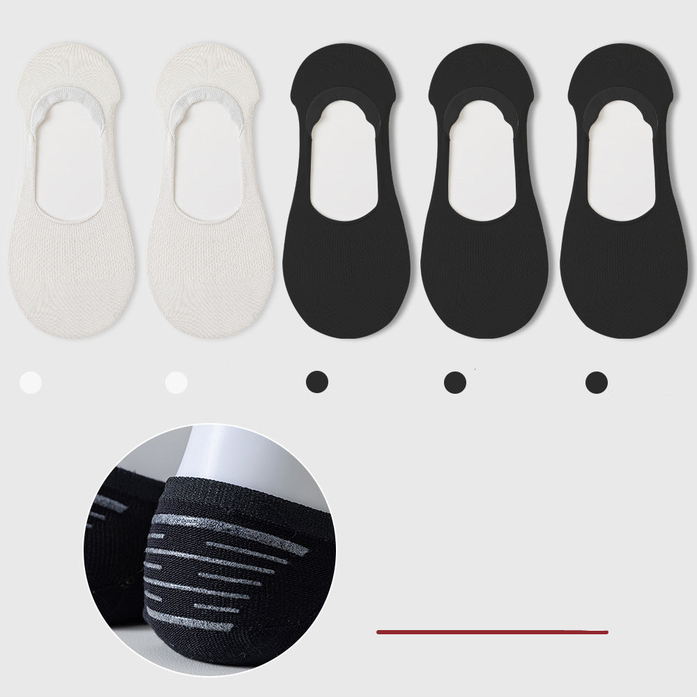 Five no-show socks displayed: two white, three black. Anti-slip technology detail shown in circular inset below