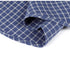 Shirt hem close-up displaying clean finishing, pattern alignment and durable double stitching