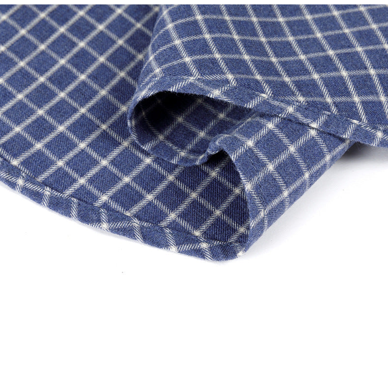 Shirt hem close-up displaying clean finishing, pattern alignment and durable double stitching