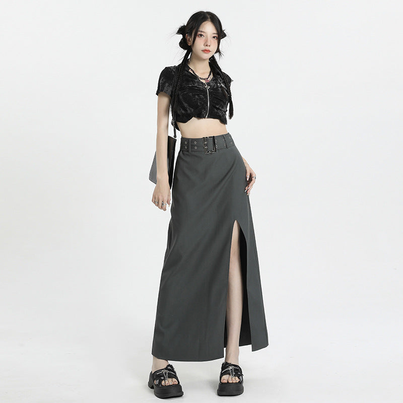 Dark gray maxi skirt with high slit paired with black velvet crop top, shown with chunky platform sandals