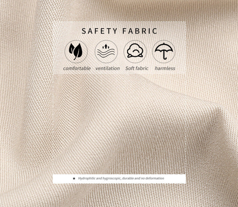 A close-up of beige fabric showing safety features including comfortable, ventilation, soft fabric, and harmless properties