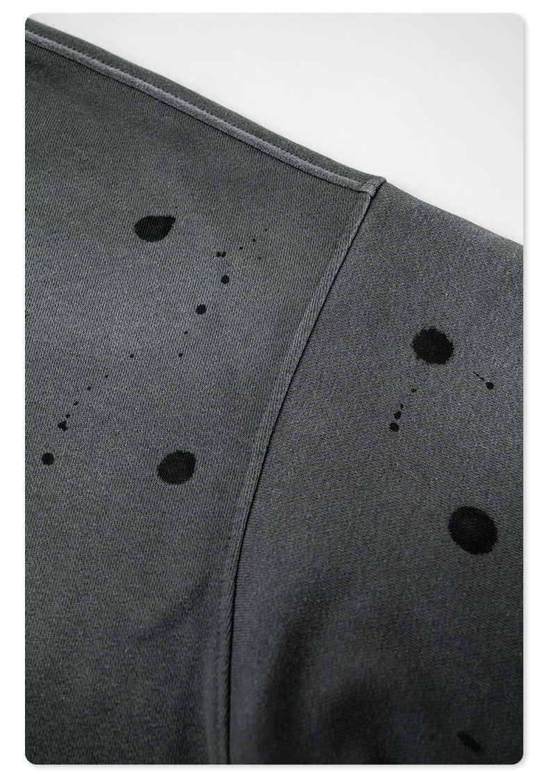 Close-up of seam construction showing splatter detail across panels