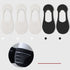 Five no-show socks arranged horizontally: three white, two black. Non-slip grip detail shown in circular inset