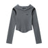 A gray cropped zip-up athletic hoodie with black shoulder panels and curved hem, displayed flat against white background