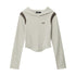 A beige cropped athletic hoodie with brown shoulder panels and small logo, photographed flat against white background