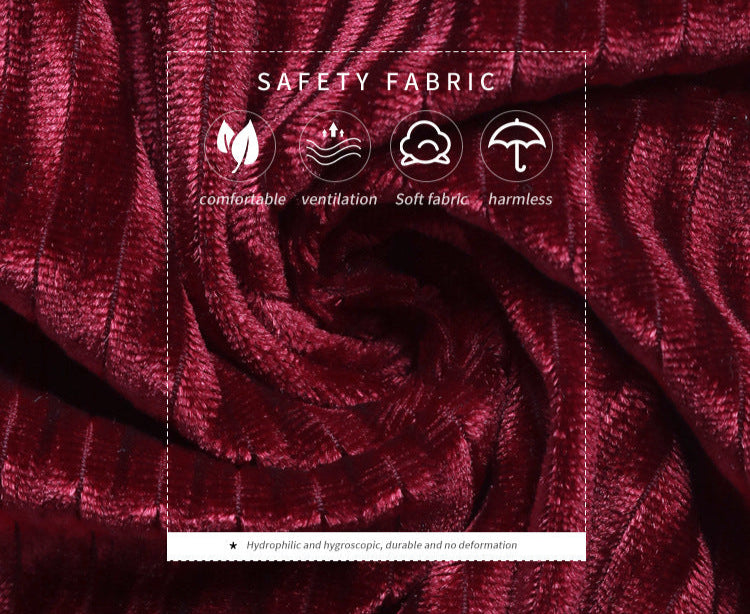 Close-up of burgundy ribbed velvet fabric with safety icons showing comfortable, ventilation, soft fabric, and harmless properties