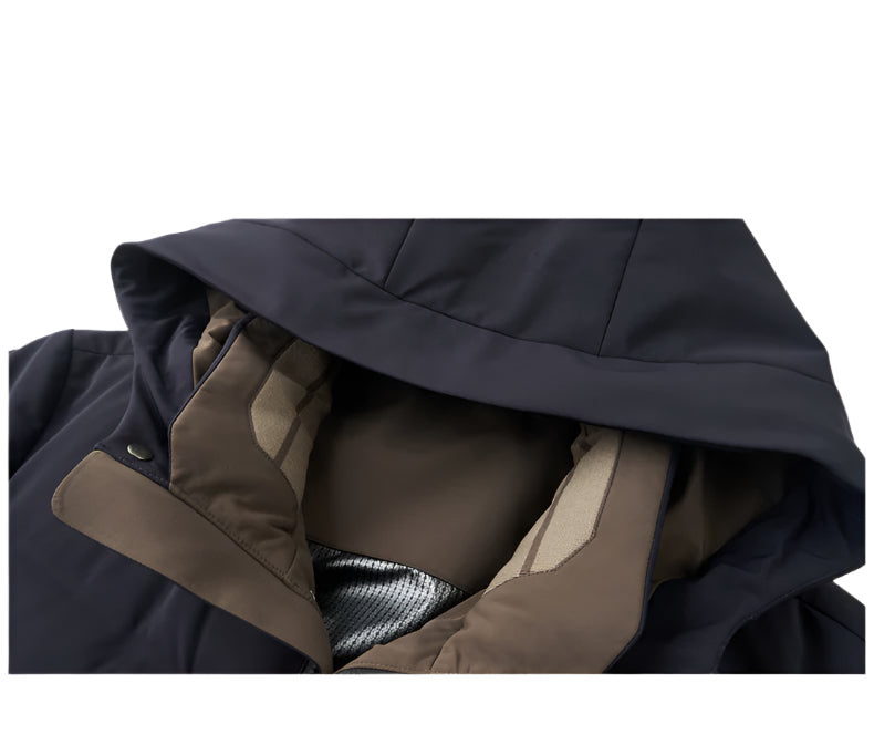 A close-up of the coat's hood, highlighting the soft brown lining, reinforced stitching, and snap button details