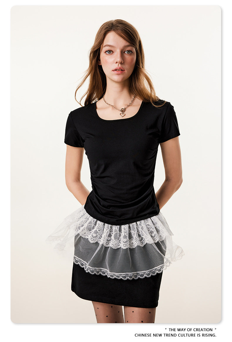 Close-up of black fitted t-shirt with lace trim detail