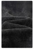 Product shot of waistband detail showing drawstring construction and front pocket on black denim joggers