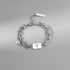 Aries zodiac bracelet in stainless steel, featuring a bold engraved charm and layered chain design for a modern look.