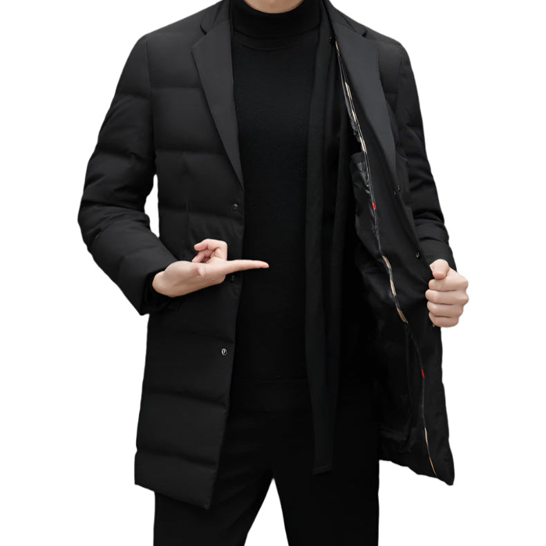 Model demonstrating black down blazer coat with one hand holding lapel to show detail