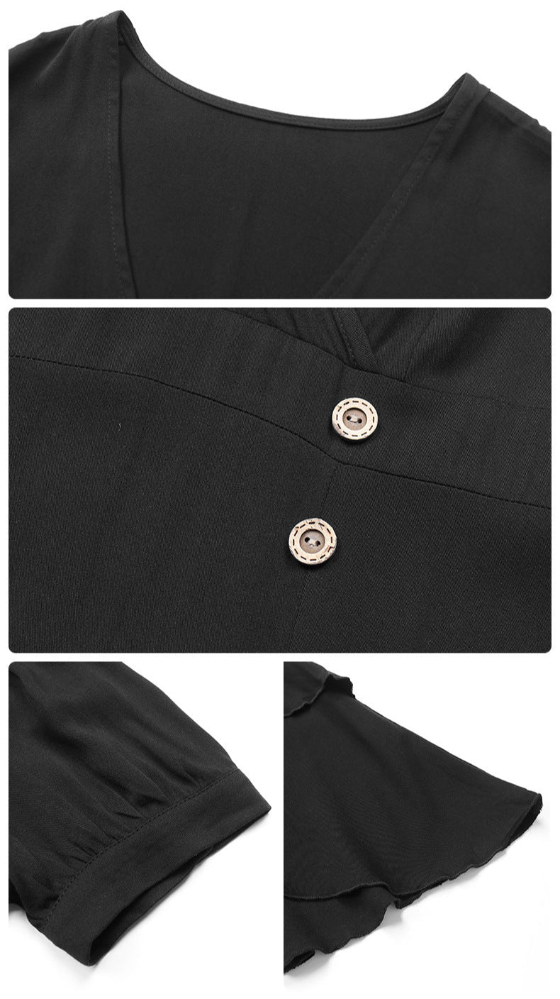 A detailed view of black dress features showing V-neckline design, decorative buttons, and puff sleeve construction