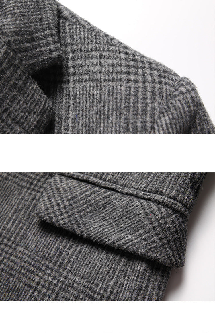 Detail of gray glen plaid blazer lapel and sleeve showing fabric texture, pattern alignment and tailored construction at shoulder seam.