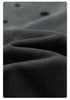 Close-up of black cotton fabric texture showing knit pattern