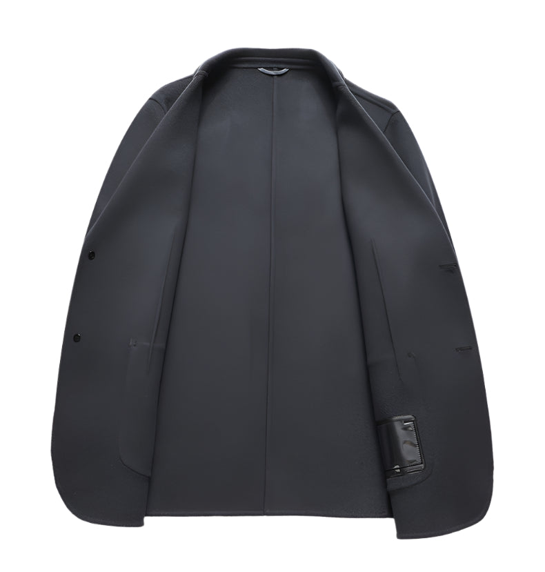 Interior view of black wool blazer showing smooth black lining and inner pocket
