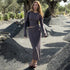 Gray ribbed crop top and maxi skirt set photographed in garden setting with olive trees, casual chic style
