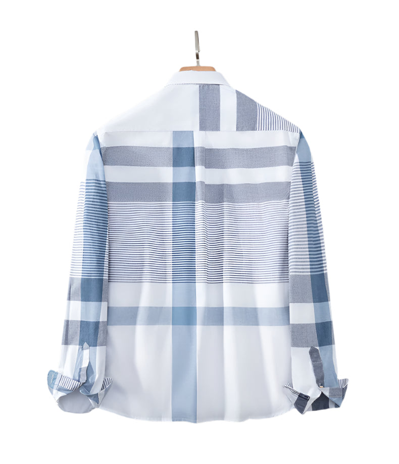 Back view of blue plaid shirt showing clean tailoring and pattern alignment across shoulders