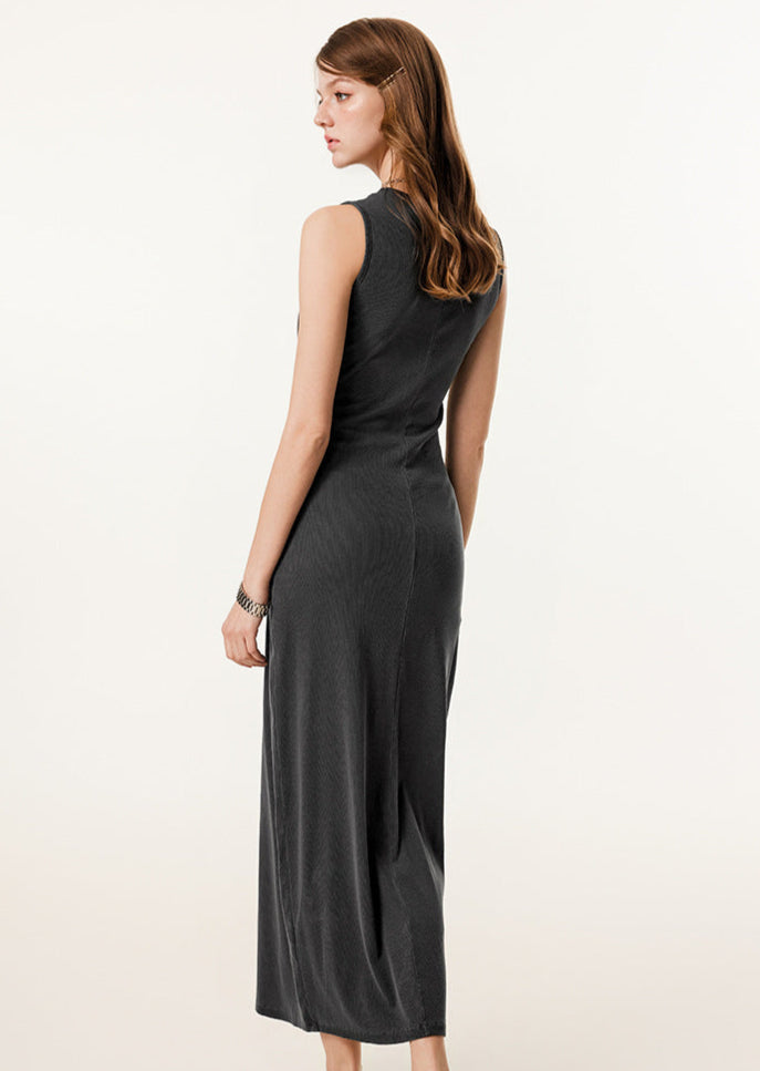 Rear view of dark grey ribbed bodycon maxi dress, showcasing the fitted design and subtle texture.