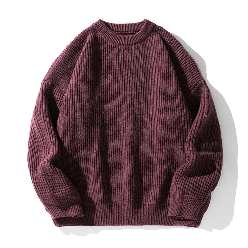 Burgundy ribbed knit sweater with crew neck and oversized silhouette