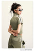 Light green crop top with white zip front, mock neck, short sleeves, white side stripes (side view)