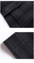 Close-up of the sleeve and hem details of the coat